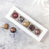 Fyldte julechokolader fra Xocolatl – fem stykker i gaveæske.