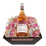 Gavekurv med rosé og chokoladekugler
