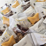 Gavekurv med Summerbird Chokolade. Små enkeltindpakkede chokolader fra Summerbird Organic.