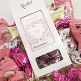 Send en sød hilsen til din mor med lækker chokolade, skum og karameller