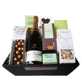 Smuk gavekurv med cava, summerbird chokolade, karameller, vingummi og snacks