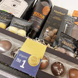 Gavekurv - økologisk gavekurv fyldt med chokolade og rødvin