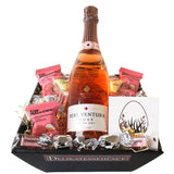 Gavekurv til påske. Istedet for et påskeæg kan man give en lækker gavekurv med cava bobler, og sødt chokolade